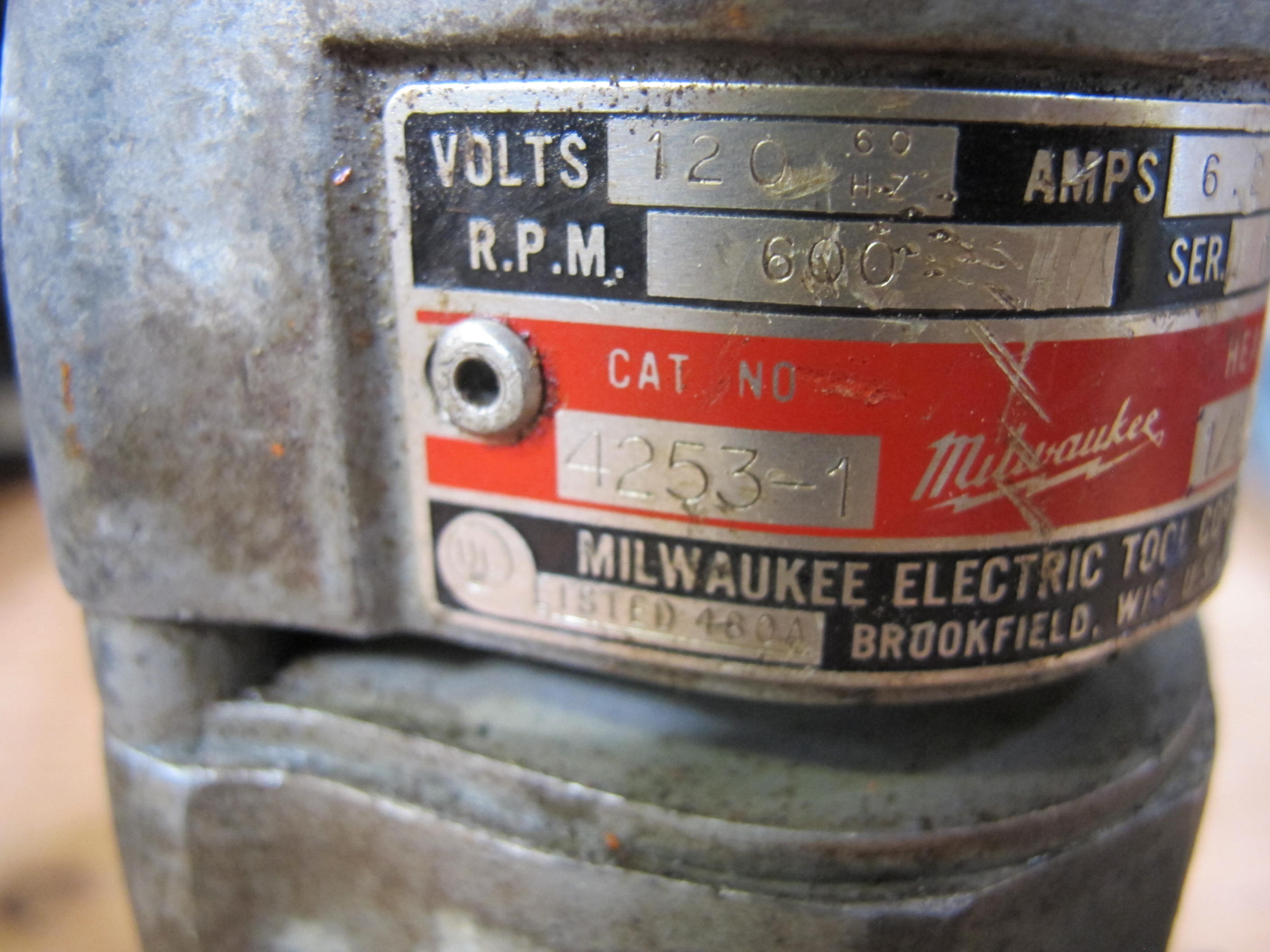 LOT TO INCLUDE: (1) MILWAUKEE HEAVY DUTY 1/2 IN DRILL, 600 RPM, 120 V 60 HZ, (1) DRILL PRESS, BUX MODEL DAH1/2NO91035 FUSE 1.6 A, 115 VAC, ATTACHED: DEWALT, DW131 1/2 IN (13 MM) SPADE HANDLE DRILL, 450 RPM. LOADING & HANDLING FEE $5-4004